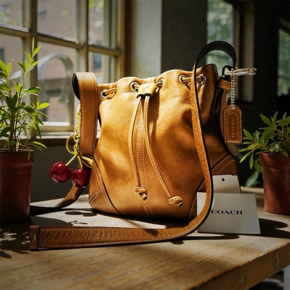 Coach Handbags - Vintage Coach soho shoulder Bag Tan Leather Drawstring Bag